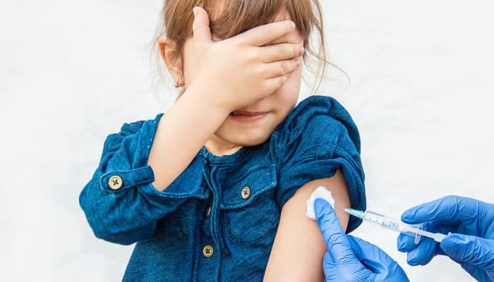 Child receiving a vaccination